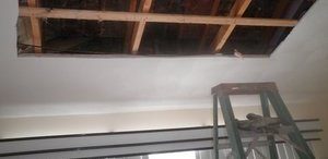 Mold and Water Damage Ceiling Restoration In Progress